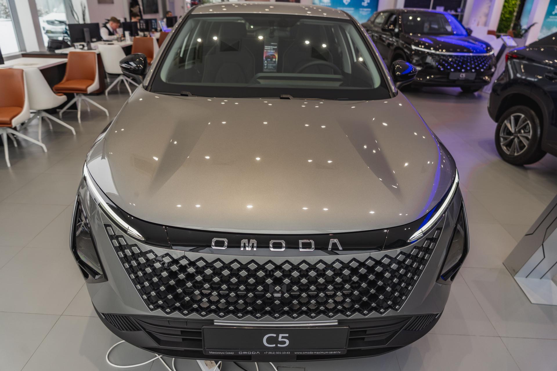 Omoda фотографии