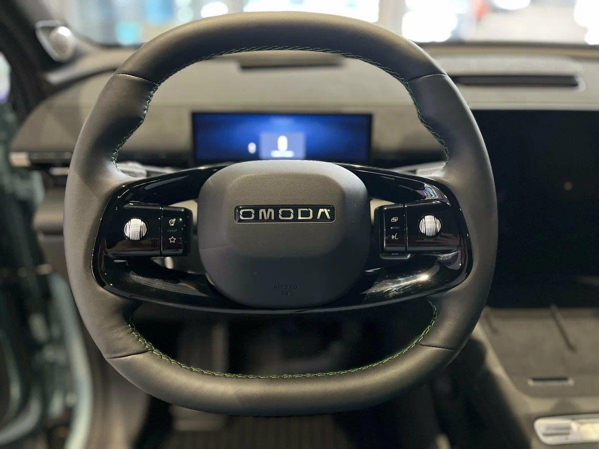 Omoda фотографии