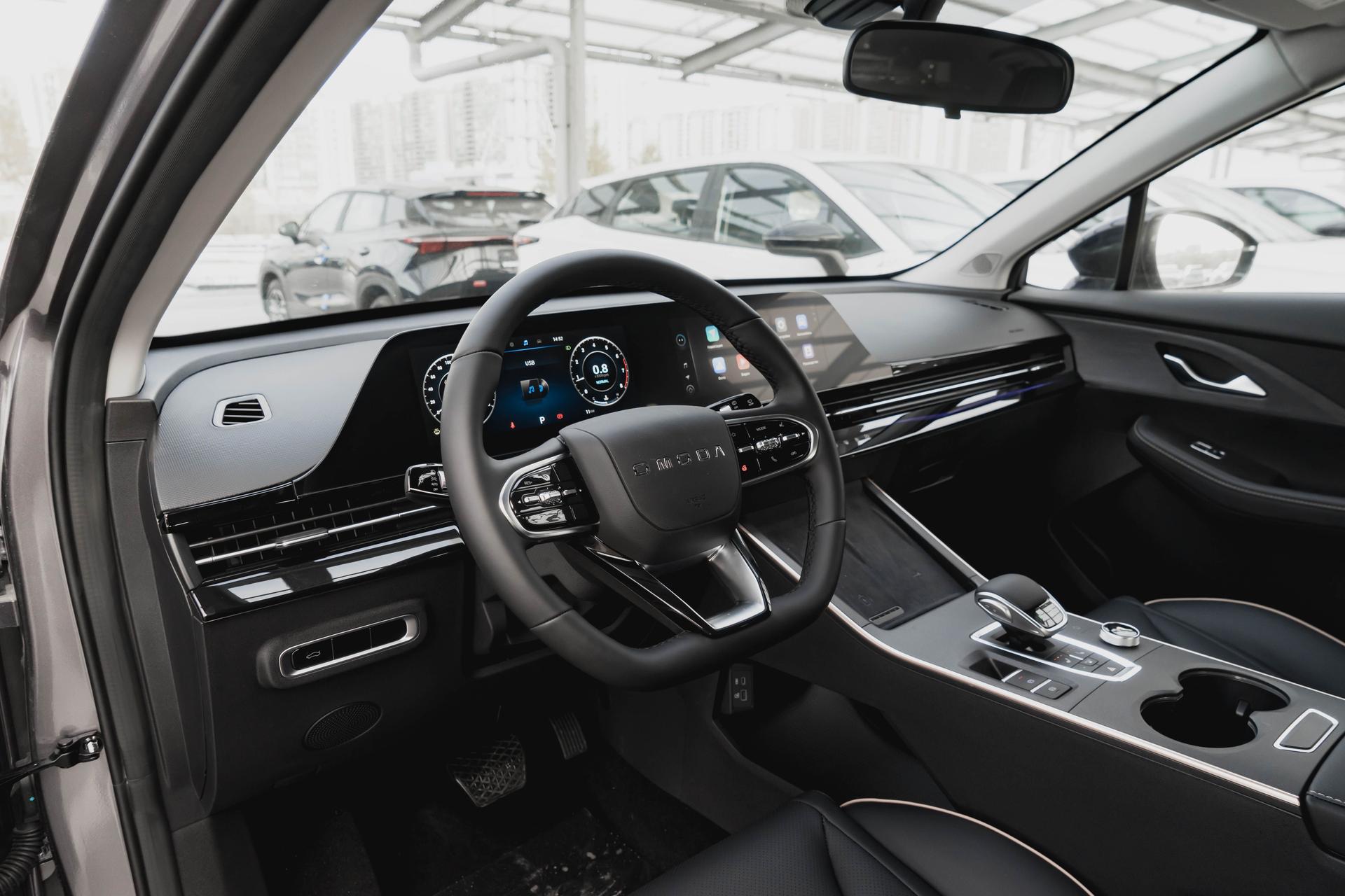 Omoda фотографии