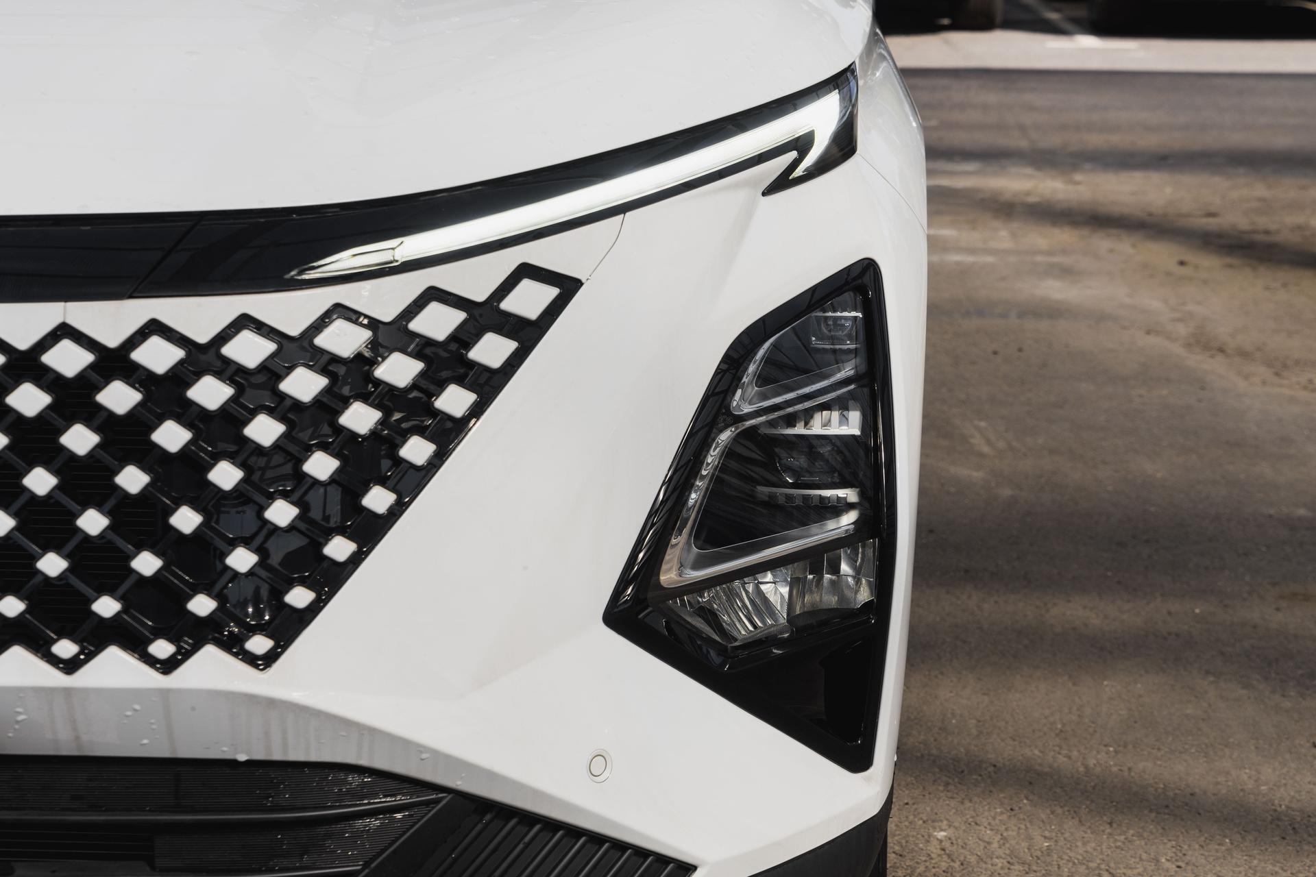 Omoda фотографии