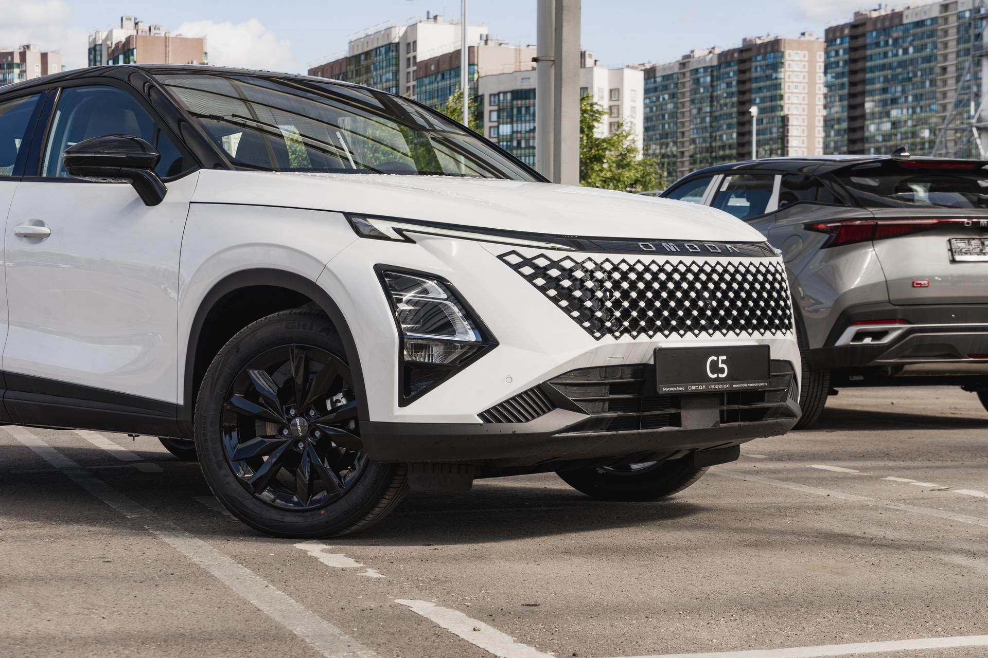 Omoda фотографии