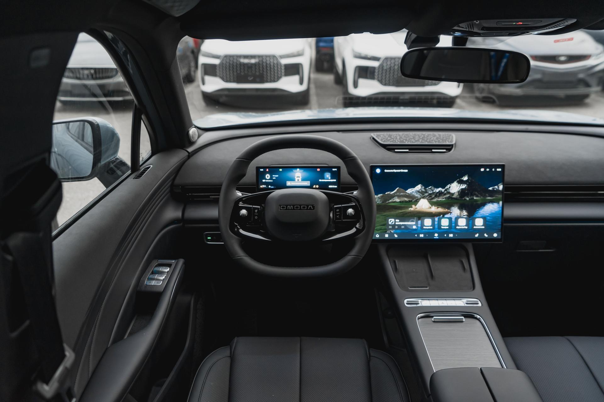 Omoda фотографии