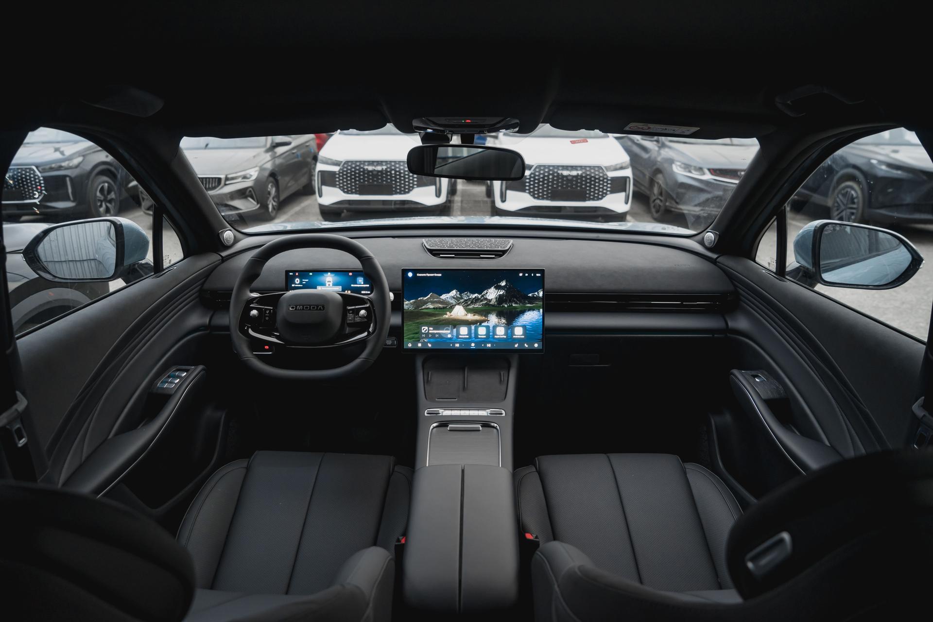 Omoda фотографии