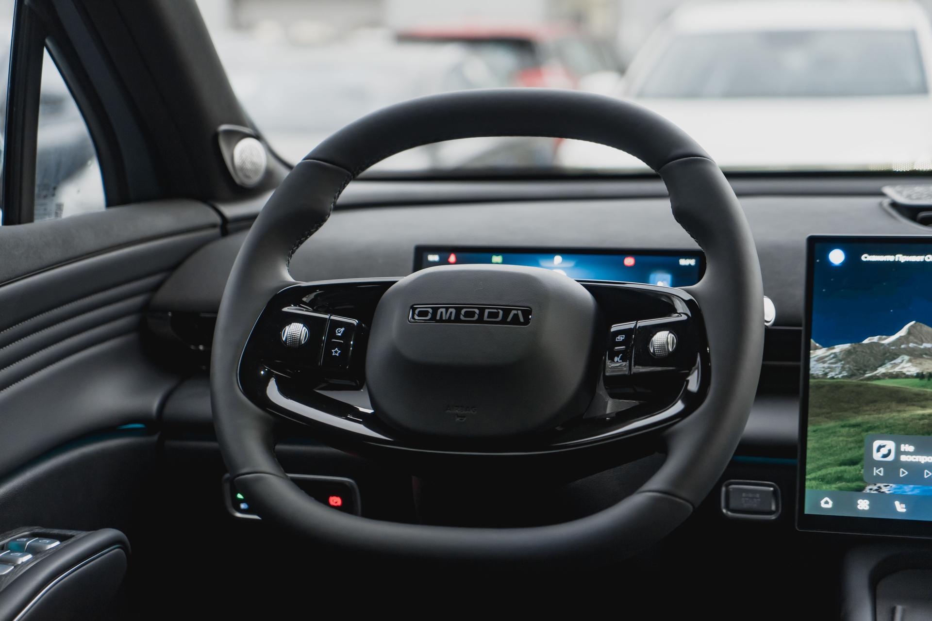 Omoda фотографии