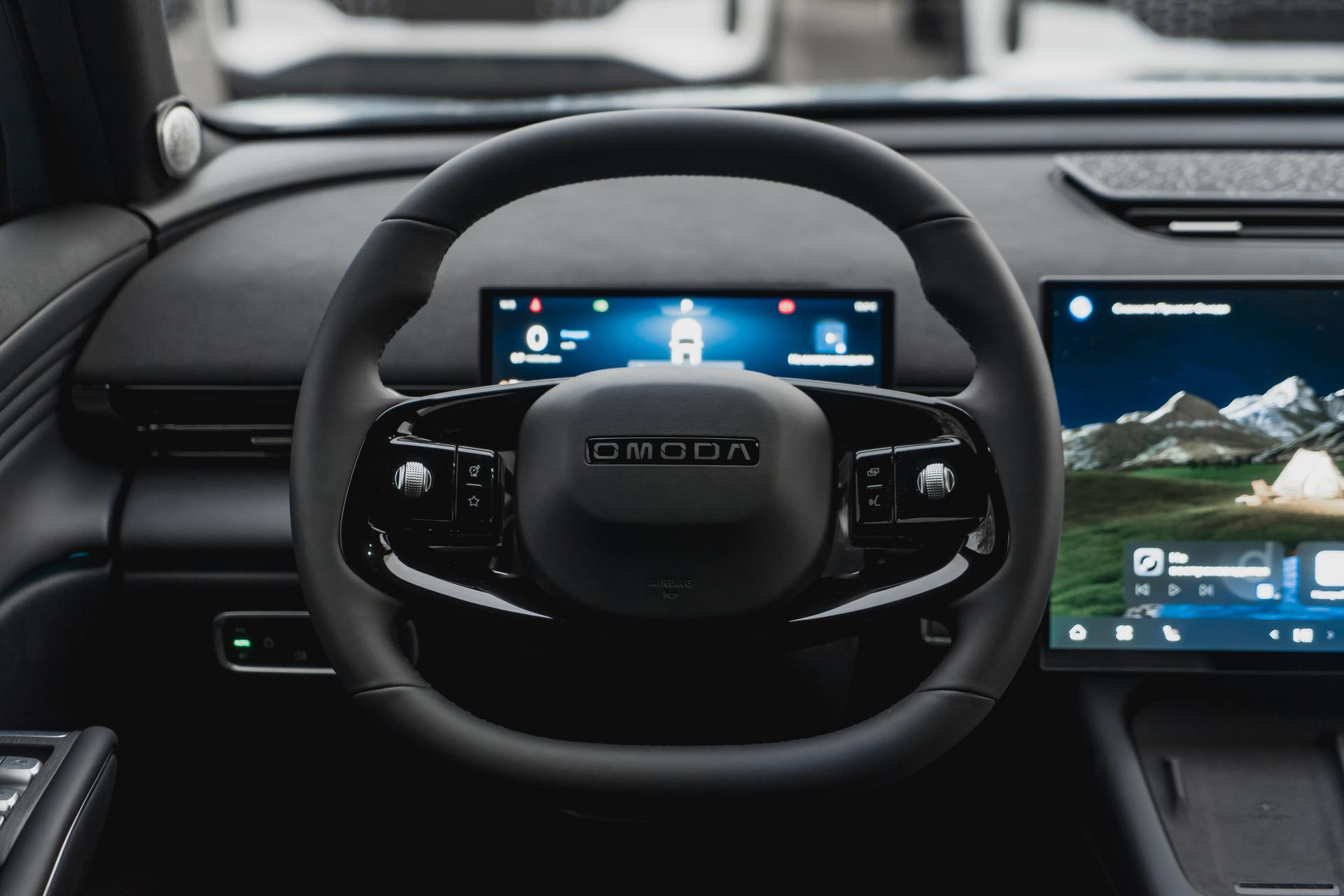 Omoda фотографии